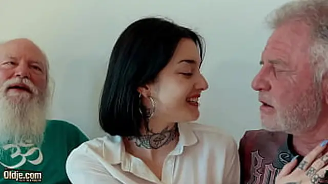 Young brunette has threesome with old men and she swallows cum